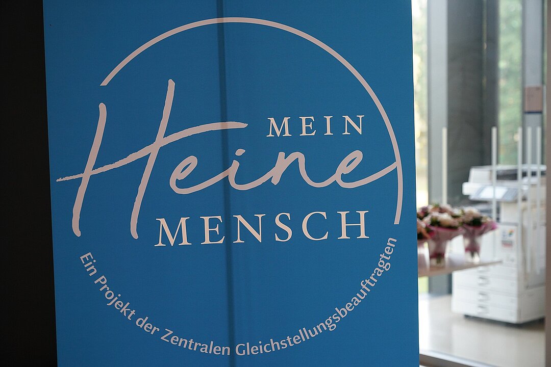 Das Logo der Auszeichnung "Mein Heine-Mensch"